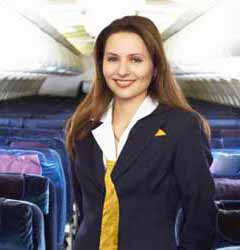 Female Flight Attendant Smiles for Photo